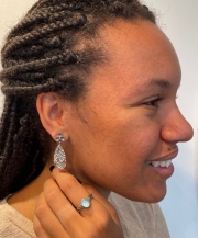 Fleur Leaf earrings and Cedar Leaf ring with blue topaz